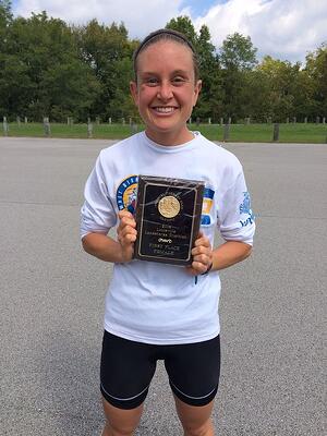 Wins Female Division of Louisville Landsharks Olympic Triathlon